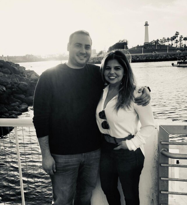 Los Angeles Personal Injury Attorney Sedrak Yenikomshuyan with his wife at the Long Beach Pier